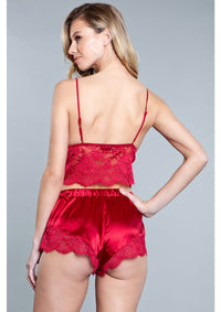 Back view of red satin top and shorts set.