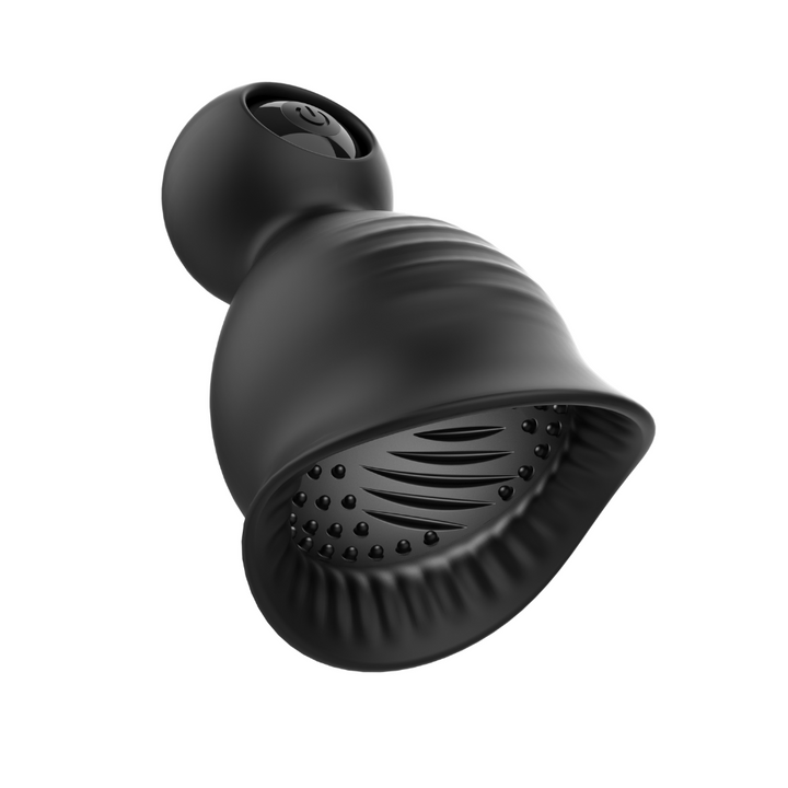 Penis tip massager from below, showing the textured interior.