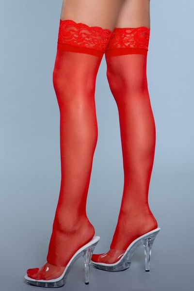 Model facing left wearing red sheer lace top thigh high stockings with backseam