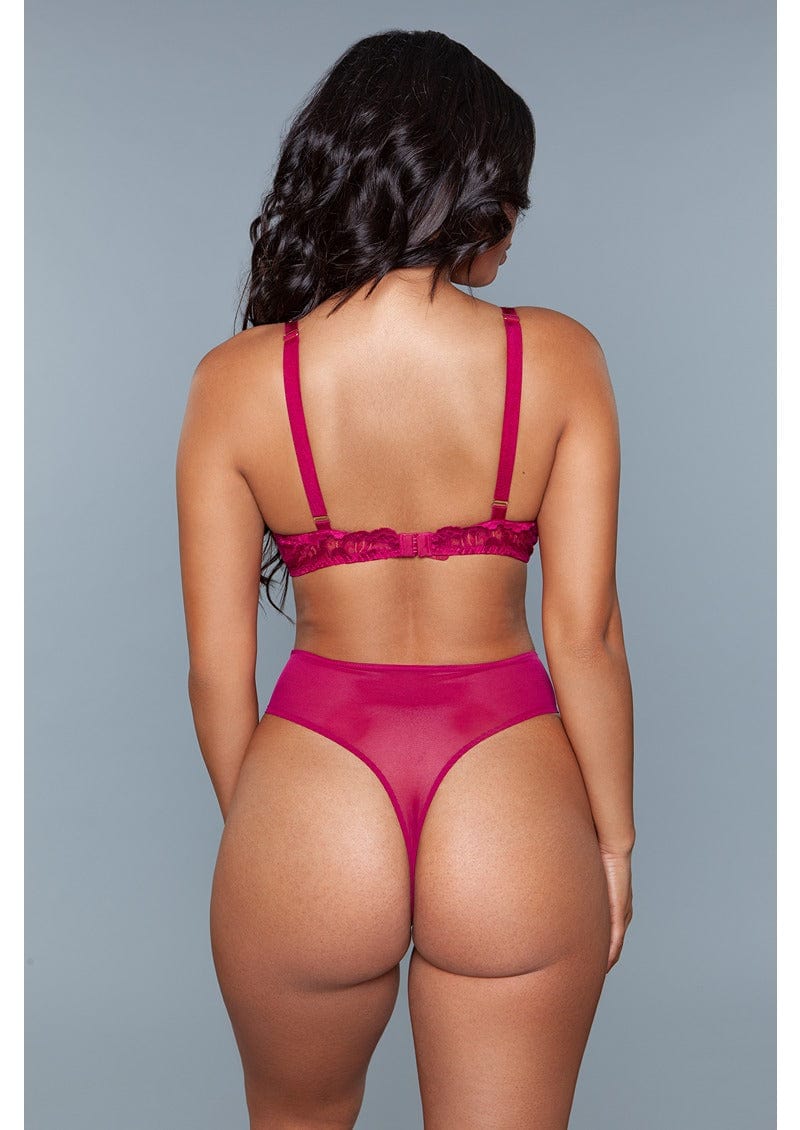 1 Piece. Lace wireless with cut-outs, stud details, and thong bottom closure facing back