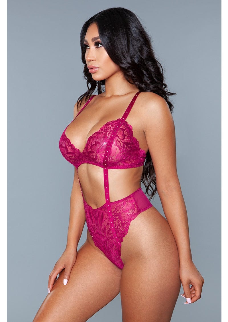 1 Piece. Lace wireless with cut-outs, stud details, and thong bottom closure facing front right