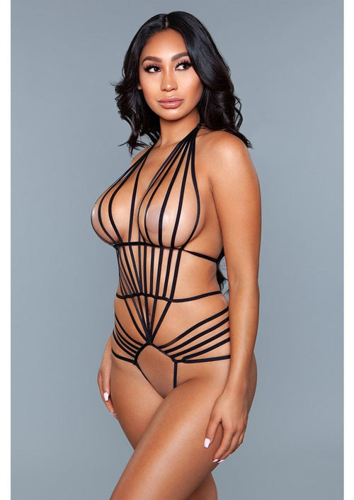 1 piece. Strappy bodysuit with strappy see-through cups, crotchless and bum-less back bottom facing forward