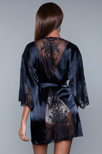 Model facing back wearing navy Satin and lace robe with Partial lace sleeves, Lace trim detail on back and tie sash