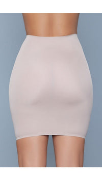 Model wearing seamless high-waist half-slip skirt body shaper in beige facing back