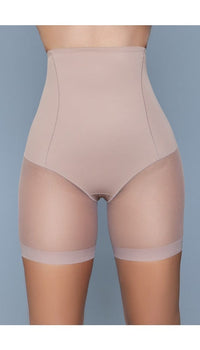 Model wearing high-waist mesh shorts body shaper with waist boning in beige facing forward