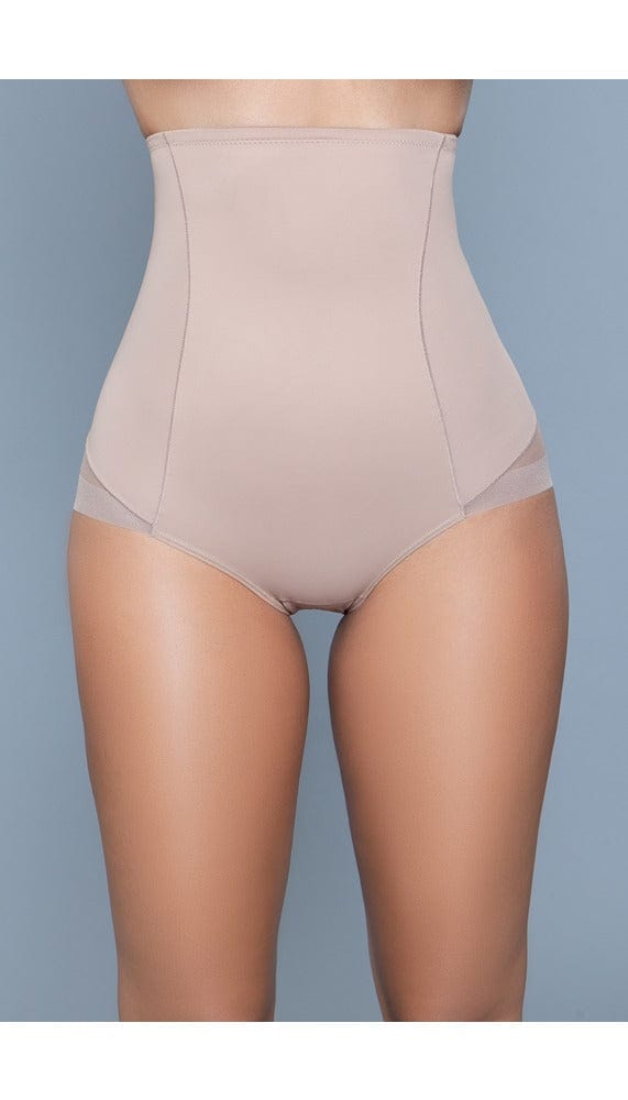 Model wearing igh-waist mesh body shaper with waist boning in beige facing forward