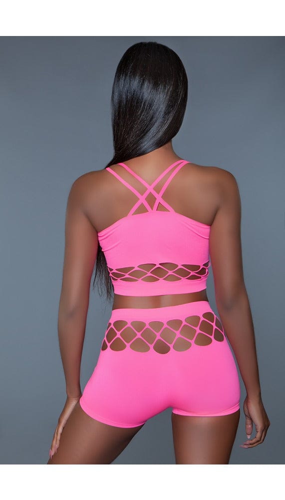 2 pc silk fishnet set that includes a tank crop top with crisscross cami straps and a pair of high-waisted booty shorts in pink facing back