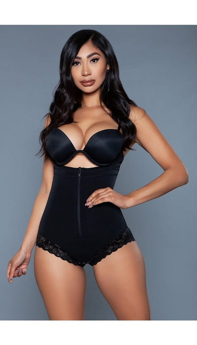 Model wearing open bust tummy control bodysuit with high waist design, front zipper and hook and eye crotch closure in black facing forward