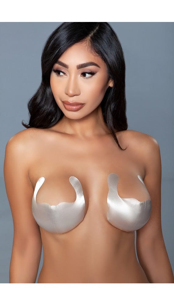 Beige nude color seamless breast lifting stickers.