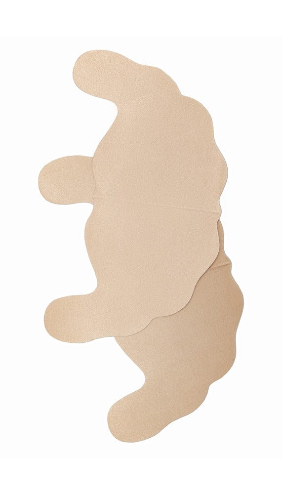 Close up view of beige nude color u-shaped breast lifting stickers.