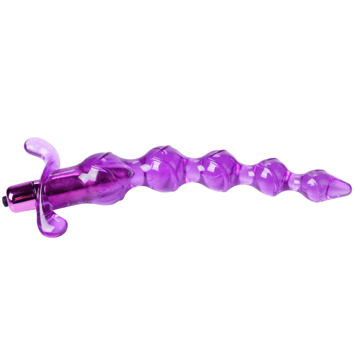 Image of the size large purple anal bead laying down.