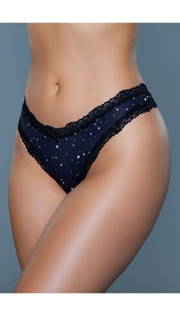 Side view of navy and black lace trim jersey thong with white star pattern and bow detail at waist.