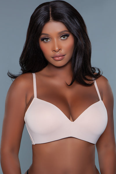 Model facing forward showcasing front of beige bra
