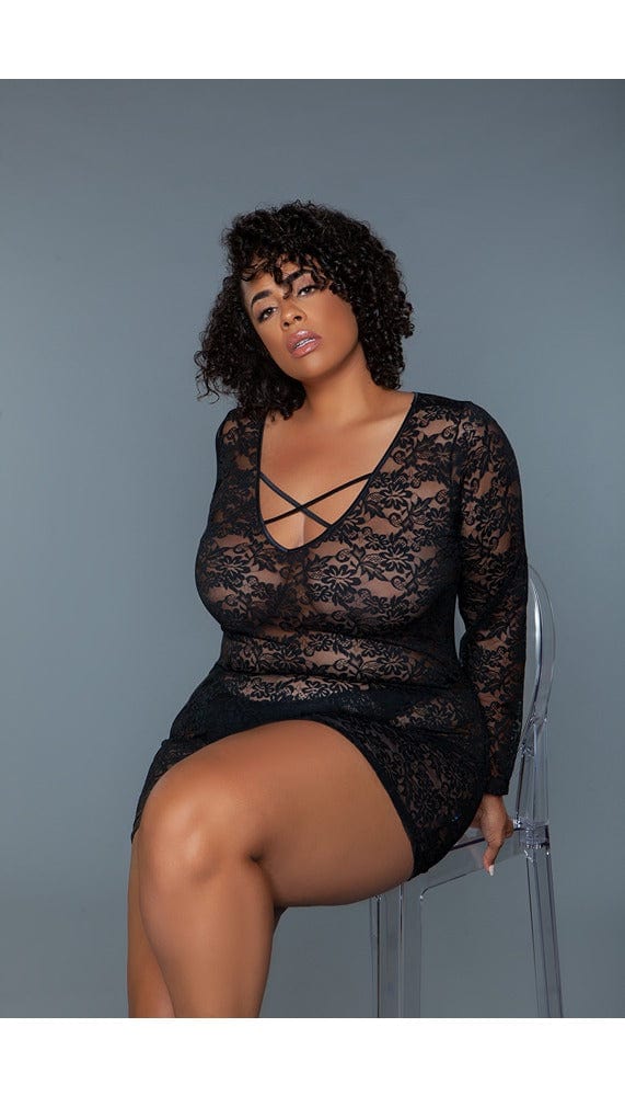 Black chemise with criss cross straps at chest.