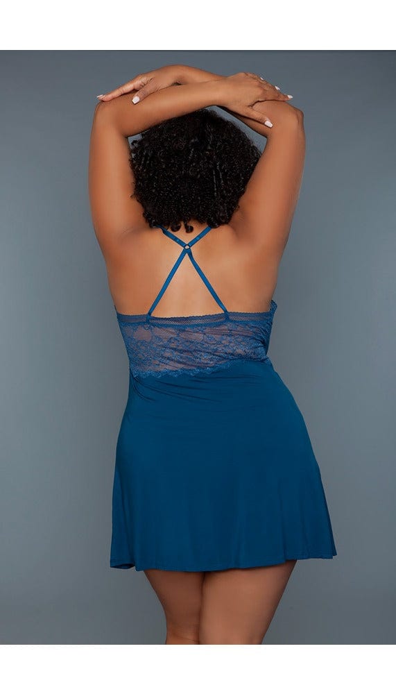 Navy babydoll mini dress with criss cross straps on back.