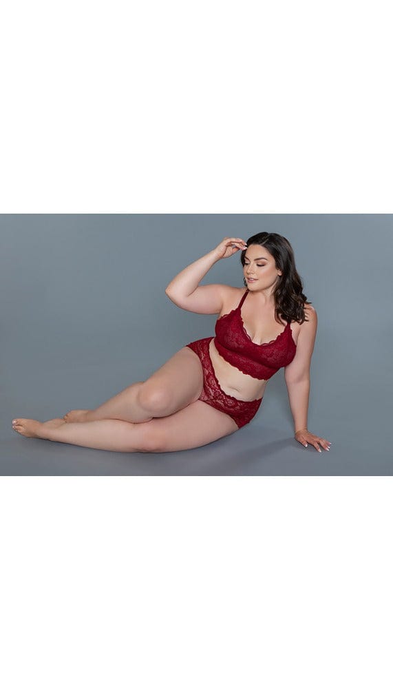 Red lace cami set with deep v-neckline.