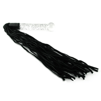 Image of the glass dildo leather whip.