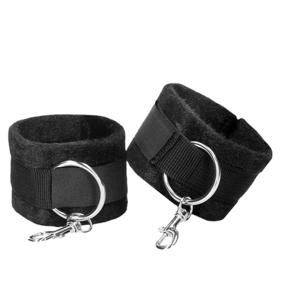 Black wrist cuffs with metal rings
