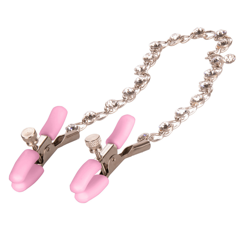 Image of the crystal chained nipple clamps laying down, with a close-up of the clamps.
