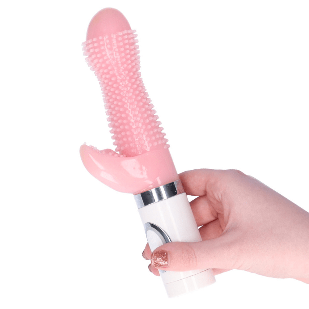Dual-action vibrator held in hand.