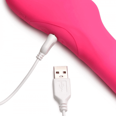 Image of the Strap U Mighty-Thrust Thrusting & Vibrating Strapless Strap-On with Remote Control with charging cable attached.