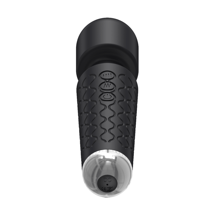 Image fo the wand massager from the bottom where the charging port is located.