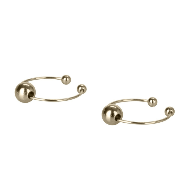 Non-piercing nipple rings laying down - gold.