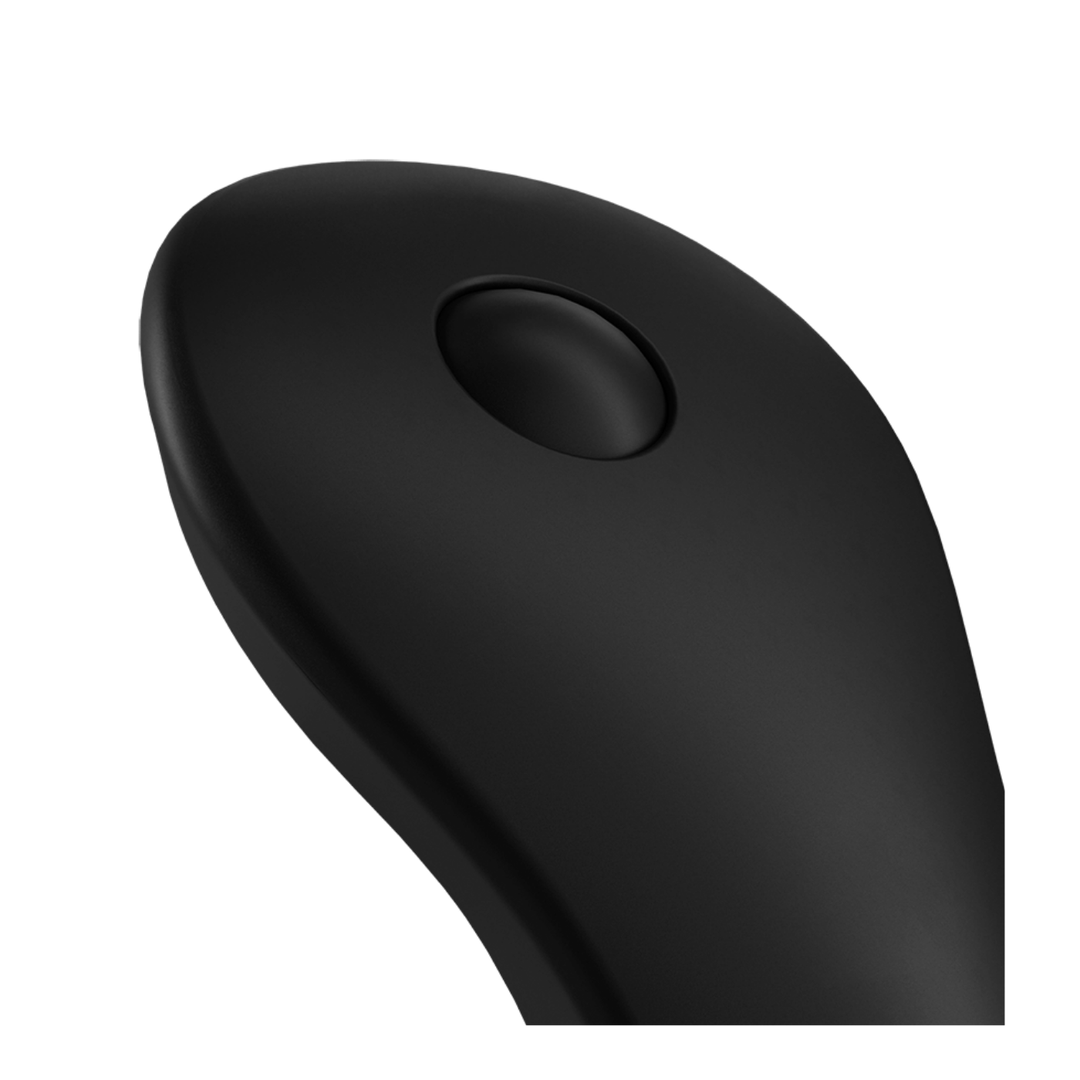 Close-up image of the top of the vibrator. The button shown controls the vibrations.