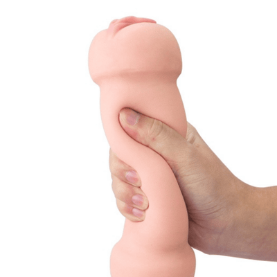 Image of soft, realistic masturbator sleeve insert being stretched in models hand.