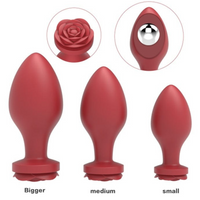 3 graduated sizes of weighted red anal plugs.