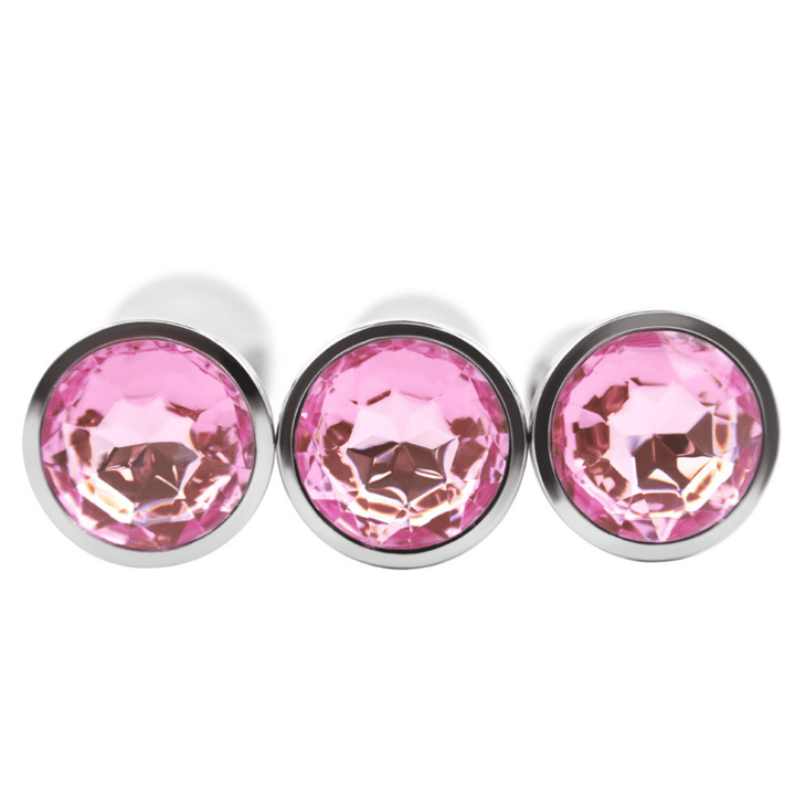 Image of all three jewel butt plugs in different sizes - small, medium, and large