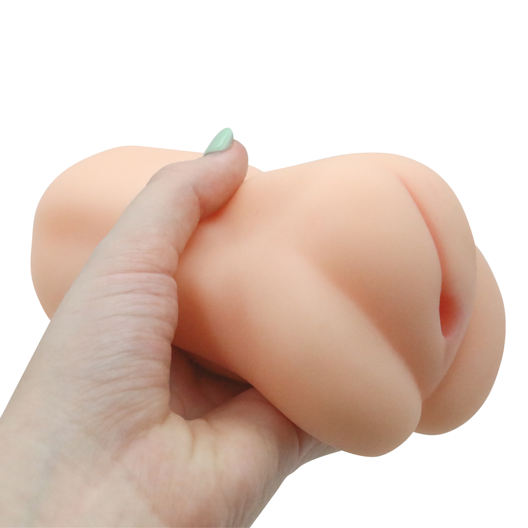 Image of the masturbator in hand. This compact toy is close-ended, meaning that it will provide intense sucking sensations that is ultra realistic! Try this massager out today for mind-blowing pleasure during masturbation!