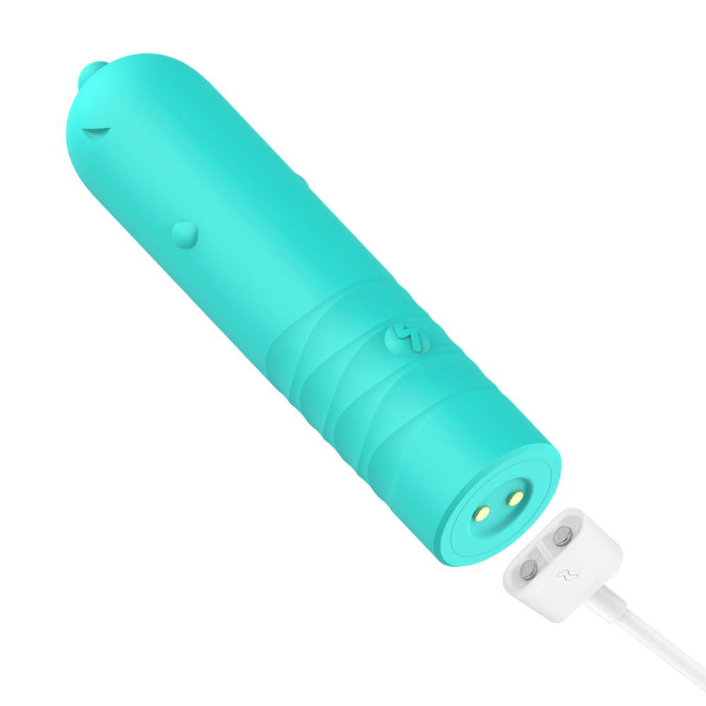 Textured vibrator with magnetic charging cord.