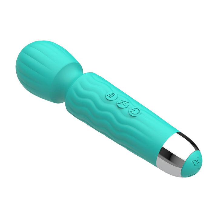 Vibrating wand massager laying down.