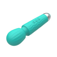 Vibrating wand massager showing head with textures