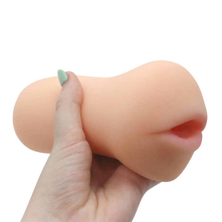 Image of the masturbator in hand. This toy is compact and easy to grip, making masturbation that much more exciting! Try this tight and realistic mouth masturbator out today for added stimulation and intense O's!
