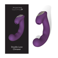 Photo of the double love climaxer next to its packaging.