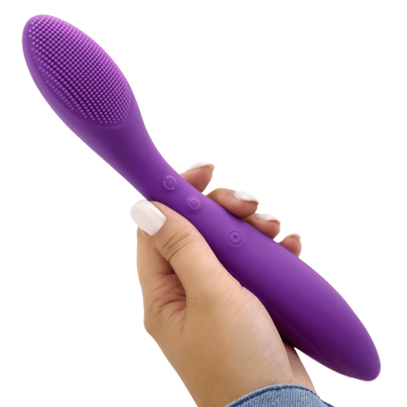 Image of the G-spot vibrator held in hand, from the front.