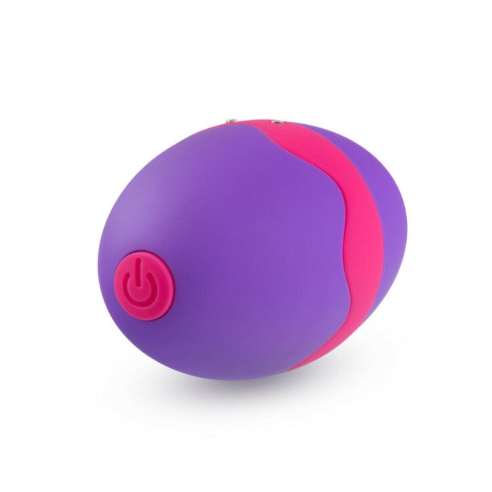 Image of the easy push-button power and function control on the base of the toy. This rechargeable vibrator comes with a magnetic charging cable for convenient recharging anywhere.