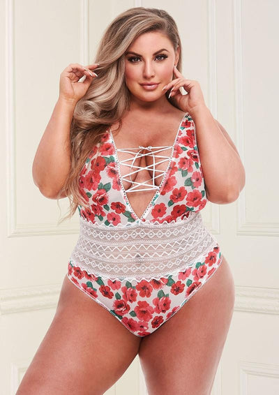 Image of the White Floral & Lace Teddy With Lace-Up Front shown on a plus size model. This sexy teddy lingerie is available in three sizes to suit any body type.