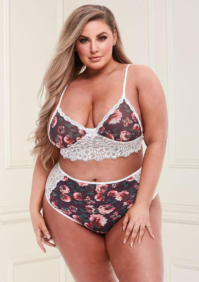 Image of the Floral & Lace High-Waisted Lingerie Set on a plus size model. This two piece lingerie set includes a sheer floral bralette and high-waisted panties with contrasting white lace panels.
