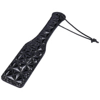 Bondage spanking paddle for kinky couples