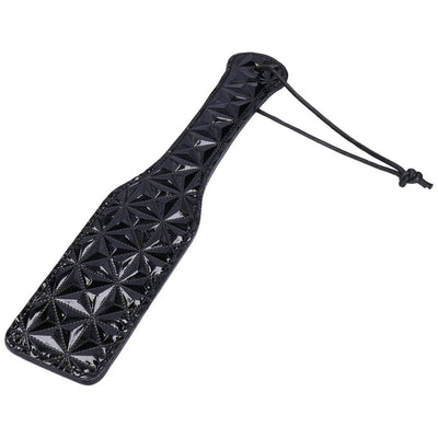 Bondage spanking paddle for kinky couples