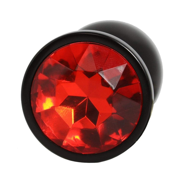 Detailed red jewel shown on bottom of butt plug