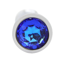 Image of metal anal plug with blue gem