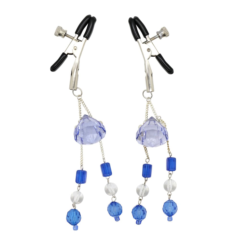 Jeweled nipple clamps.