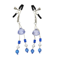Jeweled nipple clamps.