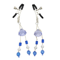 Jeweled nipple clamps.