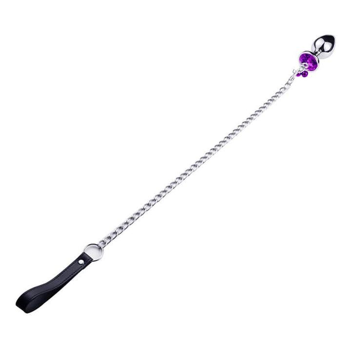 Image displays bondage leash with butt plug at full length.