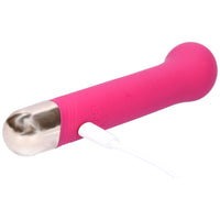 Silicone rechargeable vibrator with charging cable attached to magnetic port